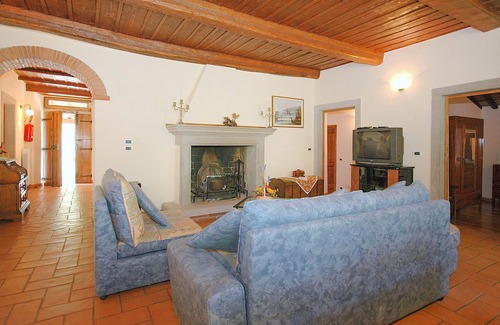 Ortignano Raggiolo House | Look forward to a fantastic view of the countryside on vacation in this appealing vacation home with