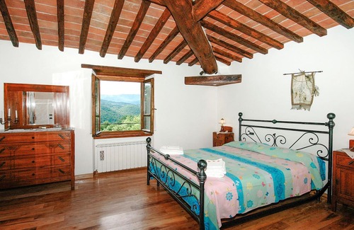 Ortignano Raggiolo House | Look forward to a fantastic view of the countryside on vacation in this appealing vacation home with