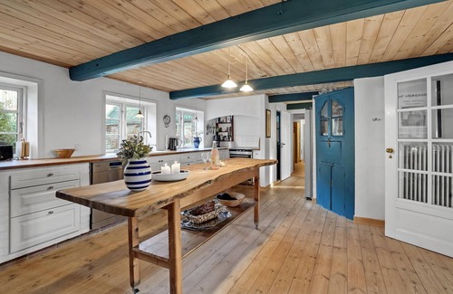 Emmerlev House | Look forward to a beautiful sea view from the terrace of this vacation home near the beach!