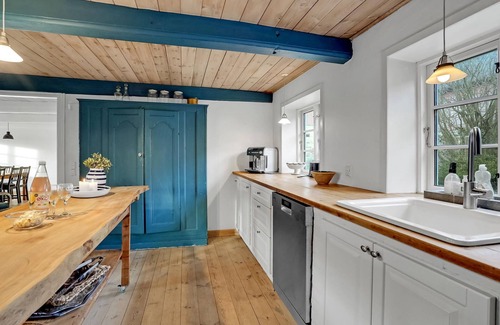 Emmerlev House | Look forward to a beautiful sea view from the terrace of this vacation home near the beach!