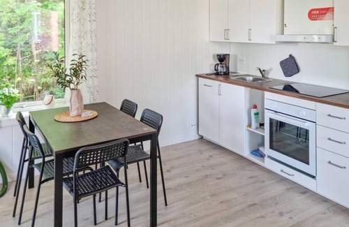 Risor House | Look forward to a great time with the family in this vacation home with fjord view!