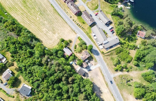 Risor House | Look forward to a great time with the family in this vacation home with fjord view!