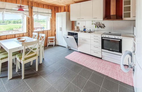 Svanesund Apartment | Look forward to a wonderful view of the Halsöfjord from this vacation home.