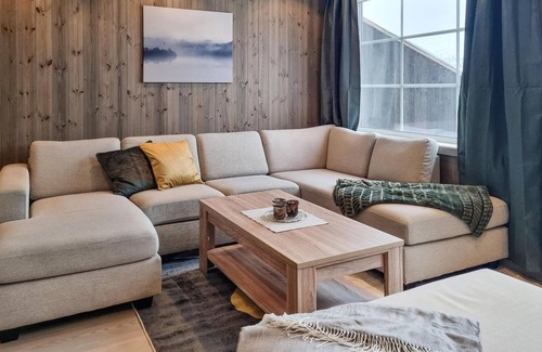 Tjaldal House | Look forward to family time together in this spacious semi-detached house with whirlpool.