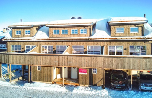 Tjaldal House | Look forward to family time together in this spacious semi-detached house with whirlpool.