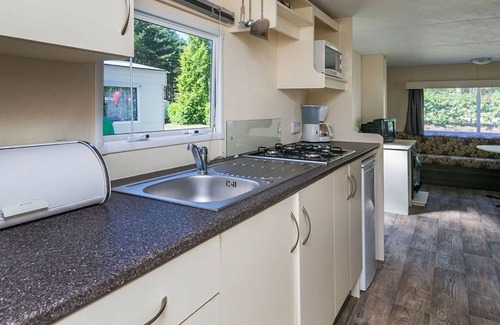 Noordoostelijk van Schaarsbergen House | Lovely apartment in villa for 6 guests with pool, WIFI, TV, terrace, pets allowed and parking