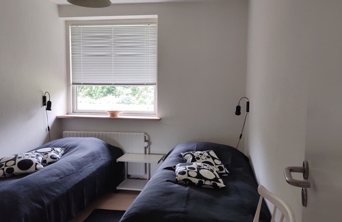 Skive Apartment | Lovely holiday apartment with a view of the fjord.