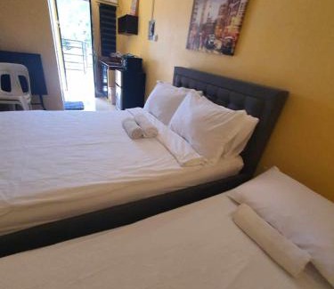 Lucena Apartment | Lucena Meg's Studio Apmnt Deluxe rm-Near SM-Wifi
