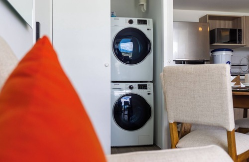 Zona 13 Apartment | Lujoso con una Vista al Aeropuerto y Montañas