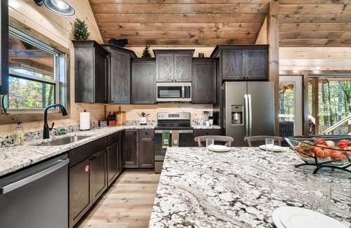 Gatlinburg - Pigeon Forge Cabin | LUXE Swimming Pool cabin * Sleeps 12 * Theater * Game Room* Firepit