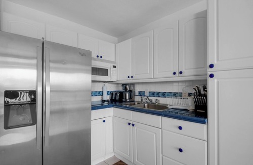 Red Hook Condo | Luxurious, Penthouse, 2 level, corner unit Oceanfront condo at Sapphire Beach