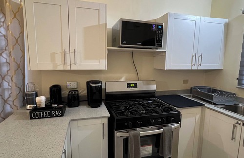 Portmore House | Luxury 2-Bedroom Retreat in Gated Community – Near Beaches & City Fun