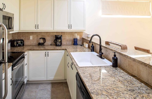 Leeward Settlement Condo | Luxury 3-Bed Condo in Leeward! 5 minute walk to the beach