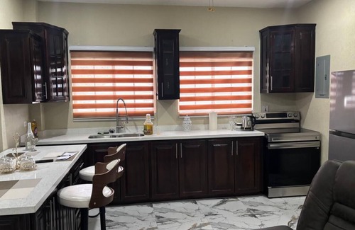Saint Andrew Apartment | Luxury 3-bedroom apartment with pool overlooking the vibrant city of Kingston.