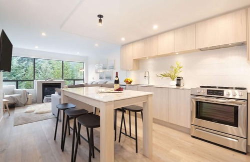 Whistler Creekside Condo | Luxury 3BR/2BA Creekside: Hot tub, A/C, Secure Bike Storage, Mountain Views