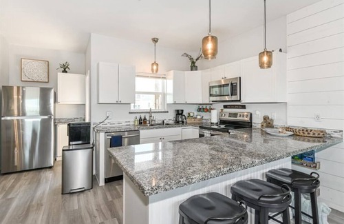 Surfside Beach Condo | Luxury Beachfront Condo with Covered Deck Steps From Beach & Golf Cart Rental