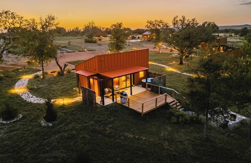 Stonewall Cabin | Luxury cabin in the center of the Texas Wine Country; large private porch w/hot tub, gas grill and fire pit; pet friendly