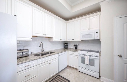 Sawgrass Condo | Luxury Condo in Sawgrass -Resort Pool, Patio + Golf Course Views