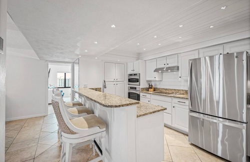Ormond-by-the-Sea Condo | Luxury direct oceanfront corner penthouse with heated pool and garage parking
