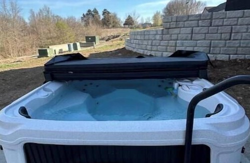 New Century House | luxury Eudora escape hot tub