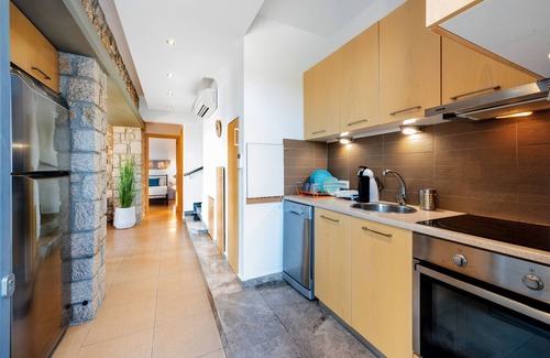 Pefkos Villa | Luxury Newly Built Stone Villa with Private Pool-Jacuzzi, Ideal for Relaxation.