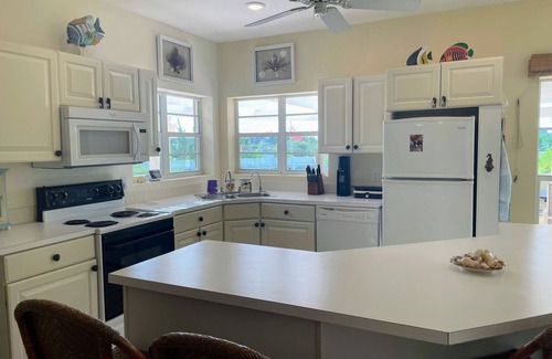 Leeward Settlement Villa | Luxury Water Front Villa with Housekeeping