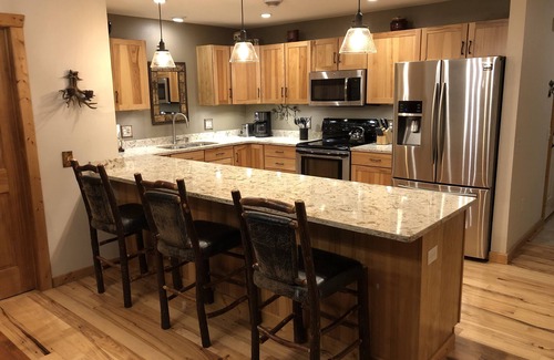 Minocqua House | Luxury Waterfront Lake Minocqua 2 Story Rustic Townhome 3bd garage