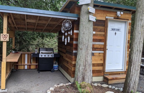 Sequim RV Rental | Madrona Glamping Tent with heater and fridge.