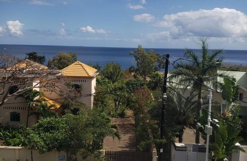 Flic-en-Flac Apartment | Magnificent sea and mountain views from the roof terrace. Quiet and restful place