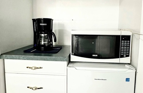 Saskatoon House | Main Central Avenue Basement Studio