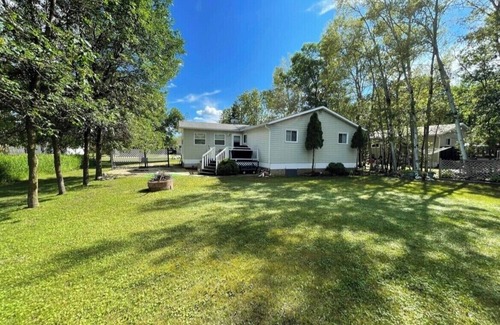 Chalet Beach Cabin | Making memories in Matlock,MB