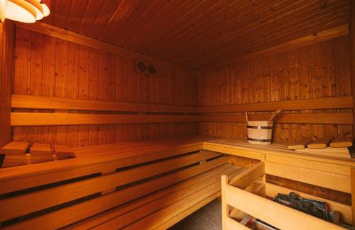 Kleinfischlingen Ski Chalet | Malerisches Holzhaus "Coco" mit Kamin, Sauna und eigenem Garten