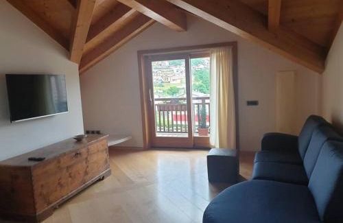 Baselga di Pine Apartment | Mansarda con terrazzo e giardino Altopiano di Piné