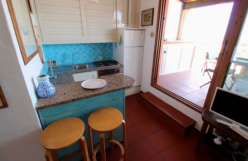 Golfo di Marinella Apartment | Marineled apartment 50 meters from the beach, swimming pool, restaurant bar, wifi