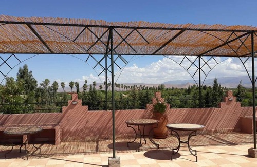 Sidi Abdallah Ghiat House | Marrakech Riad room with mountain and pool view