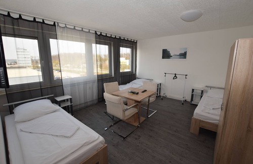 Wolfschlugen House | Messezimmer AB Apartments
