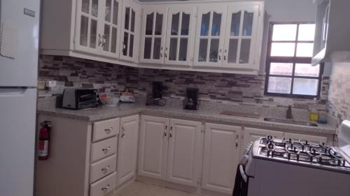 Charnocks Apartment | Michand Guest Apartments- Cozy one or two bedroom- 5 walk minutes from airport 10 mins drive to Oistins or beach