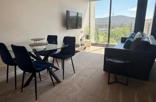 Braddon Apartment | Midnight Luxe 1BR Apartment in the heart of Braddon Views from L7 Pool Sauna Gym Secure Parking Wifi Wine