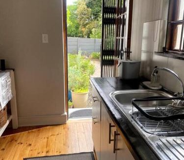 Claremont Apartment | Milner Cottage: Digital Nomad Oasis