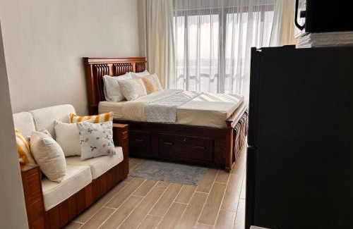 Syokimau Apartment | Mimah's cozy getaway near JKIA at Taurus Residences