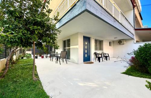 Olymbiaki Akti House | Minimalist Seaside Apartment with Private Patio and Parking - Blue Zone Homes
