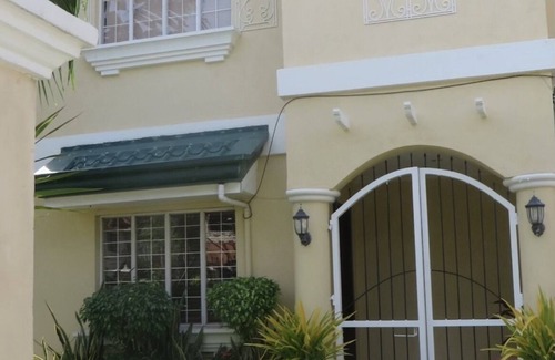 Suba Basbas House | Model house located within a gated community close to shopping and attractions