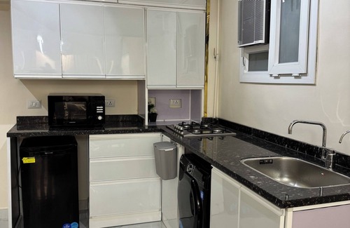 Al Khankah Apartment | Modern 2-Bedroom Apartment in Obour City – A/C, WiFi & More!