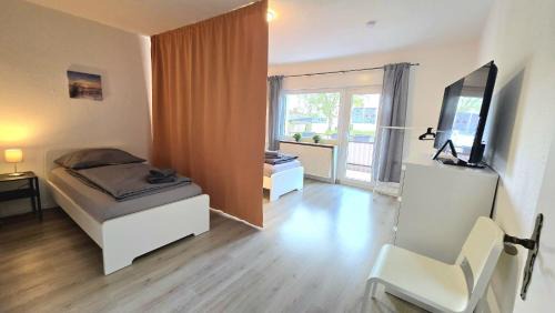 Hagen-Hohenlimburg Apartment | Modern 3-Room Apartment with Balcony & Free Parking & Free Wi-Fi in Hagen - HL01