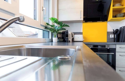 Bad Krozingen Apartment | Modern apartment with balcony, wifi & kitchen
