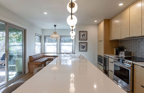 Austin House | Modern Austin Retreat: Chef’s Kitchen, Fireplace & Walkable Prime Location