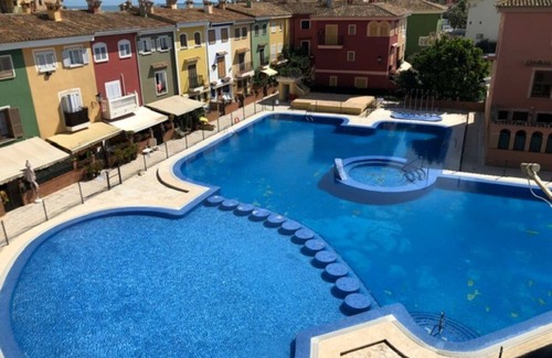 Port Saplaya Apartment | Modern beachside apartment a few minutes walk from shops, bars and restaurants.