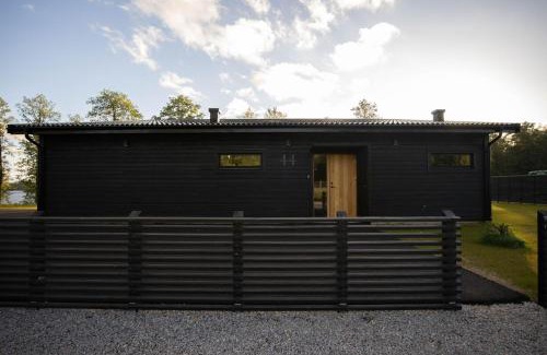Ryssby Villa | Modern boende med sjöutsikt