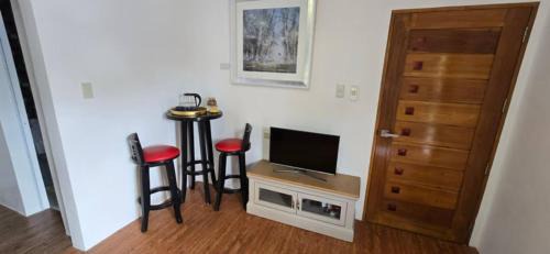 Lubao Bed & Breakfast | Modern chalet type building set in quite garden area
