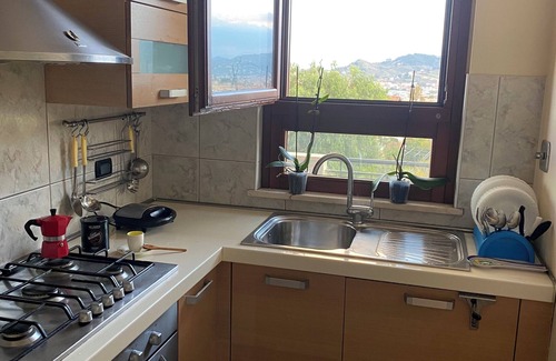 San Martino Bassa Apartment | Modern condo with ocean and mountain view. 2 minutes from the beach and malls
